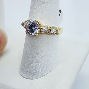 Brand New Sterling Silver 925 With Round Center Stone And baguette stones